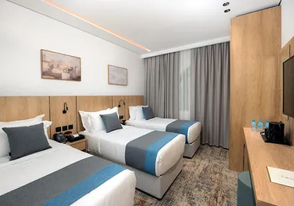 3 Single Beds in As’Saafa Golden Hotel