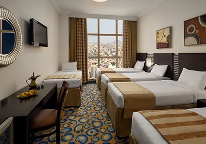Room with 5 single beds