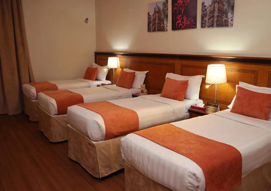 /media/umrah-images/4-single-beds-room%20%284%29.webp