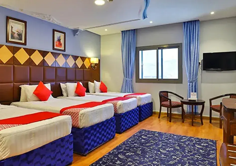 /media/umrah-images/bedroom-area.webp
