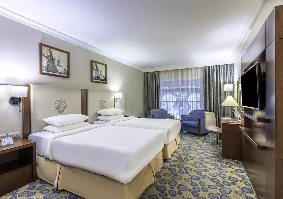 /media/umrah-images/room-view-with-2-single-beds.webp