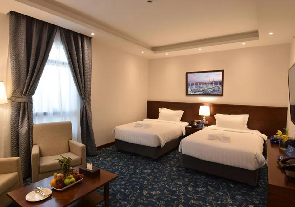/media/umrah-images/two-single-beds-room%20%281%29.webp